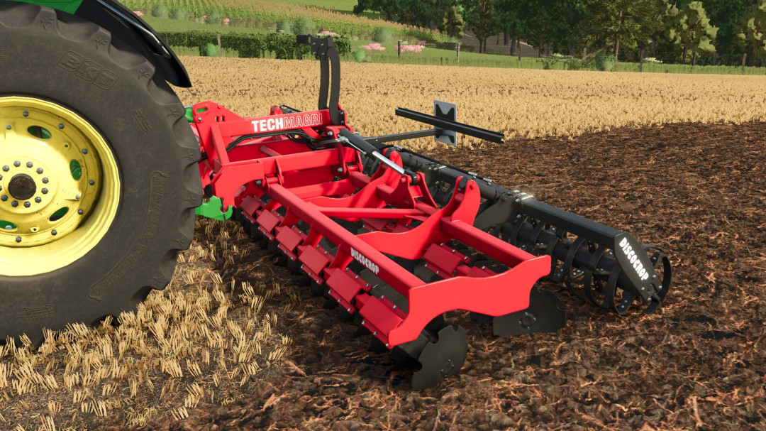 Farming Simulator 25 mod: Techmagri Discocrop 2000 mounted behind a tractor, used for soil cultivation in Farming Simulator 25.