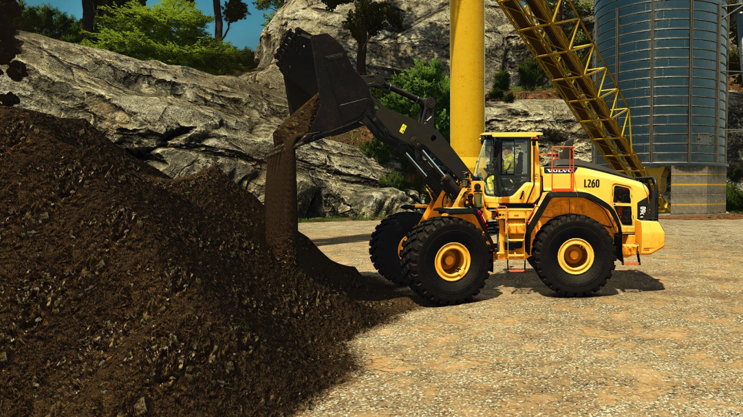 Farming Simulator 25 mod: Volvo L260 wheel loader handling soil and rocks on construction site