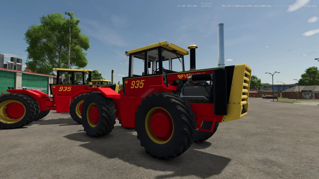 Farming Simulator 25 mod: Versatile 935 tractor, red with yellow accents, shown in a yard environment with trees and buildings in the background.