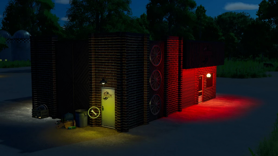 Night view of a modded building in Farming Simulator 25, featuring colored lighting and tire decorations for FS25 mods.